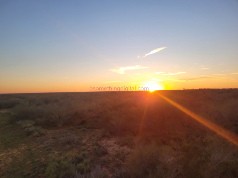 Texas sunset over brush